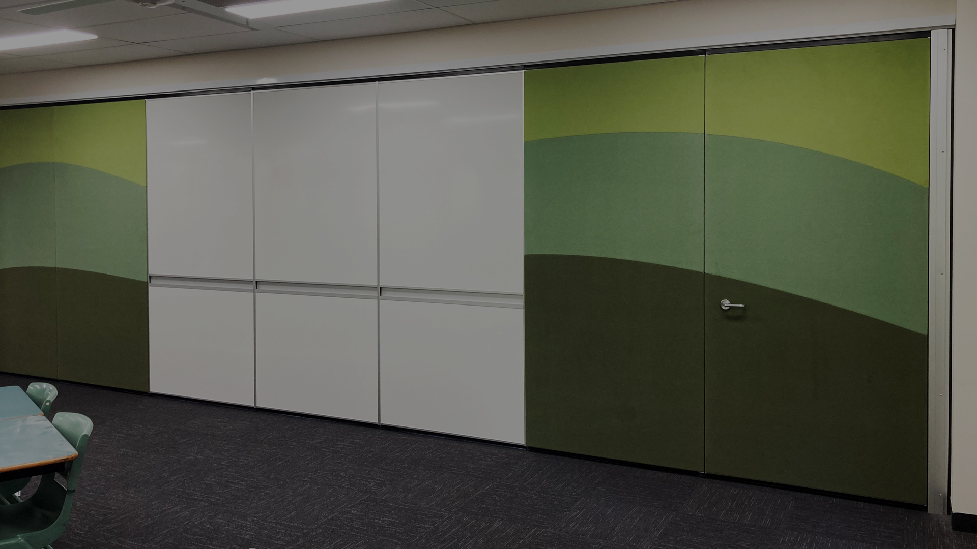 solid operable walls with whiteboard, fabric panels