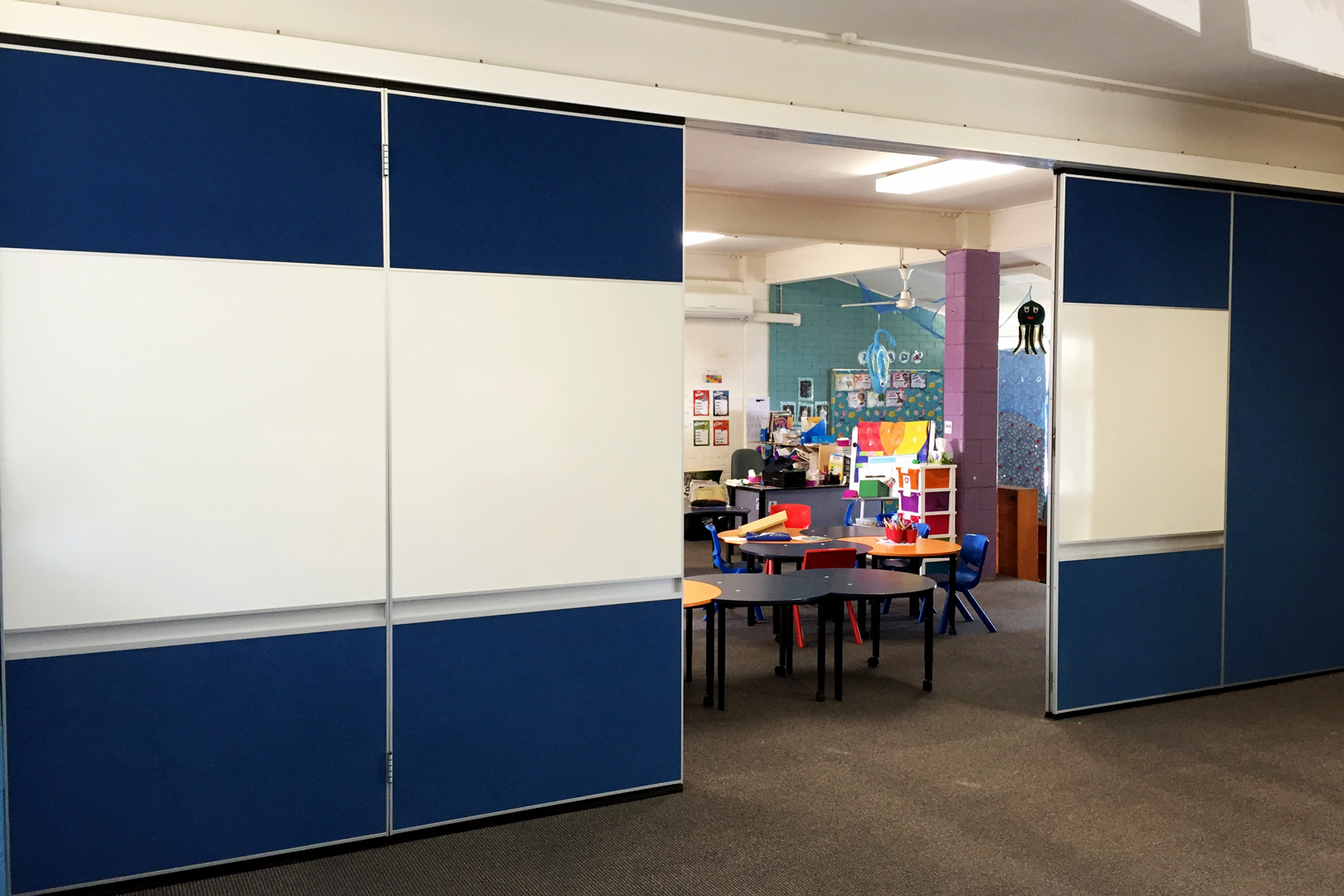 operable wall with whiteboard and pen rail