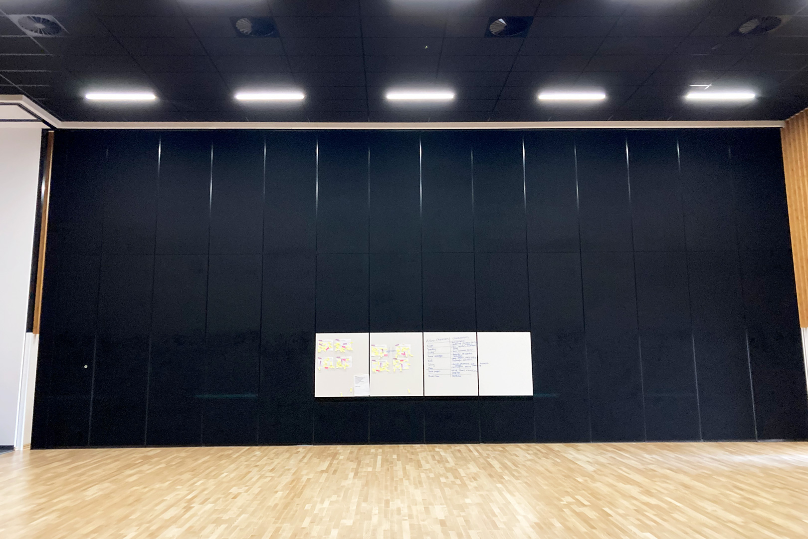 6m tall operable wall with inset whiteboards