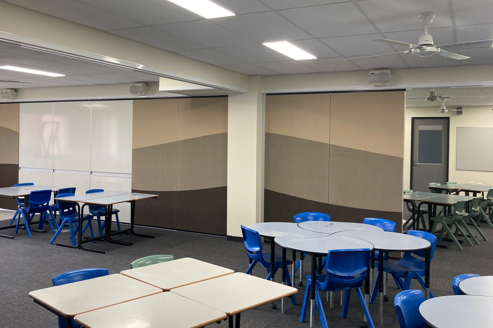operable wall with fabric panels and whiteboards with pen rails