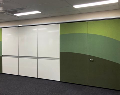 operable wal with whiteboard and pass through door