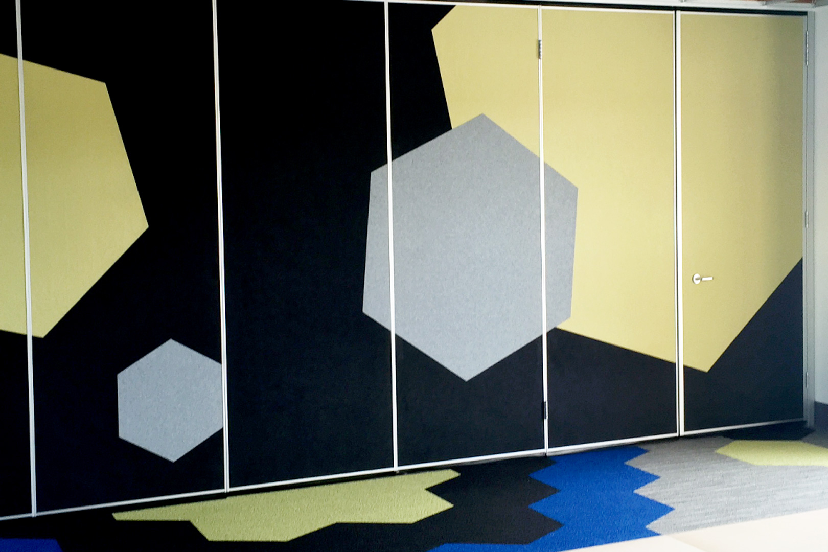 solid operable wall with fabric panels