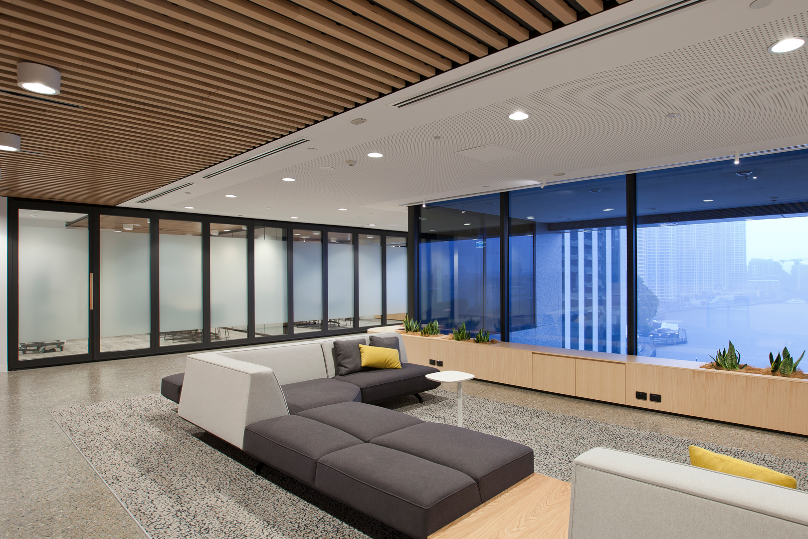 glazed operable wall for commercial fitout